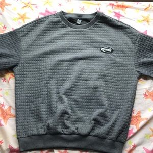 dazy waffle sweater, “progress” embroidery, very roomy medium